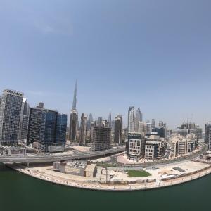 Spacious High-Floor Two Bedroom Apartment with Full Burj Khalifa & Dubai Canal View in Dubai